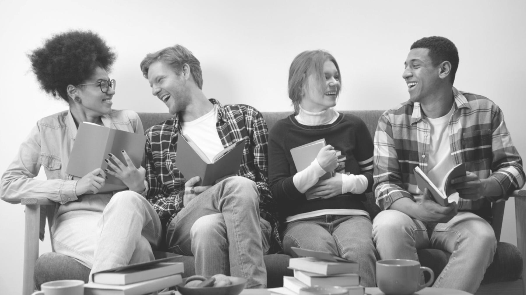 Students working on coding projects with modern development tools and collaborative workspace setup